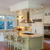 Coastal Living Kitchen Design Studio - White Wall Cabinetry & Olive Colored Island