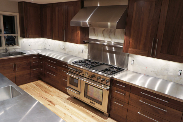 WalzCraft Custom Walnut Cabinet Doors and Molding in Contemporary Kitchen
